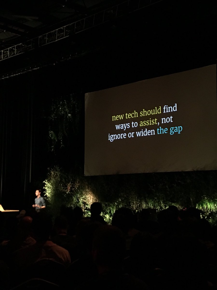 Suz Hinton presenting a slide with the content „new tech should find ways to assist, not ignore or widen the gap”.