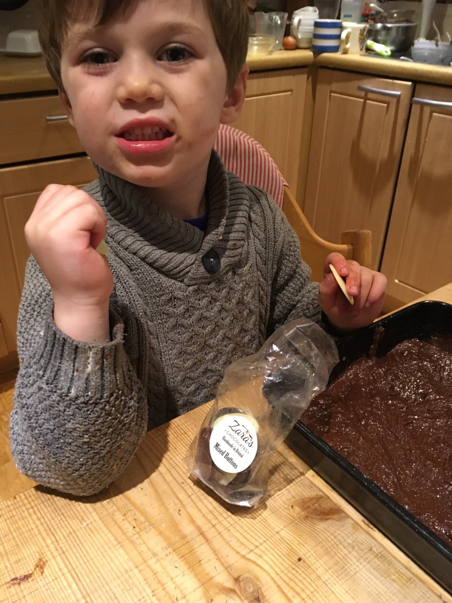 Happy_Holistics's tweet photo. @ZarasChocolates Buddy enjoying his buttons, they are meant to be going on top of the Brownies. That’s his best smiley face! https://t.co/no4wutugo9
