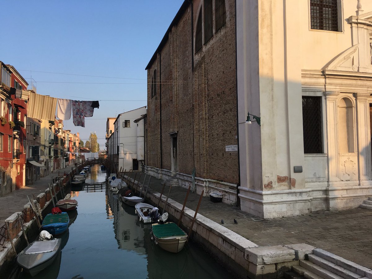 Normal Venice scene, I know. But who asked the priest if they can fix their washing line to his church?