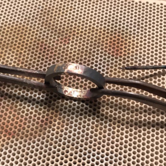 JeanneMarell's tweet photo. Not pretty (yet)! Dovetail wedding band just after soldering the white gold and rose gold halves together. After a clean up it should look more intriguing! #workinprogress #sundaybenchday #benchpegselfie #dovetail https://t.co/wCcoAAoJox https://t.co/fJ0FDr6Jlg