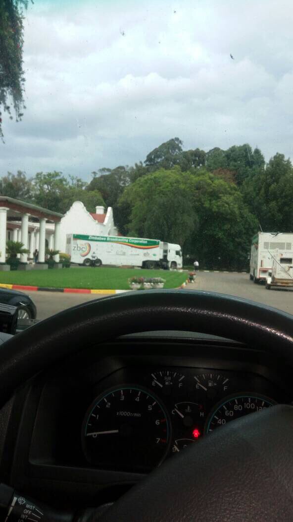 TrevorNcube's tweet photo. ZTV OutSide Broadcast vans at Statehouse. We don’t know what President Mugabe wants to share. We are all ears #Zimbabwe 👇🏿 https://t.co/oj2d2HoYal