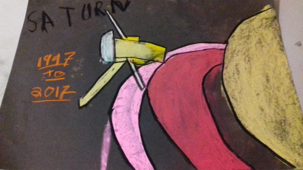 skysketcher's tweet photo. A very stylish @CassiniSaturn by a boy aged 10 at the 3rd #SpectacularCassini of the day .#ScienceWeek #ScienceWeek2017 #MayoScienceFest Awesome https://t.co/I2IMKeV9ac