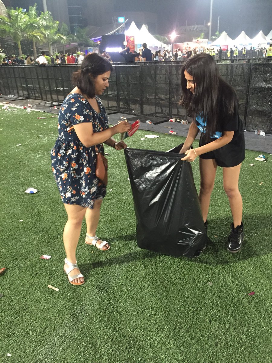 Seconds after I tweeted, we found this young girl Nilansha Garg actually picking up the trash and immediately joined her.