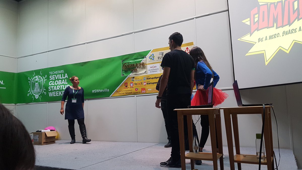 SWsevilla's tweet photo. ¡Superheroes en el escenario! Vienen a enseñaros #ComicWall, tu app para vender tus cómics #SWSevilla #TGSW2017 https://t.co/y4I9ZzZNjy