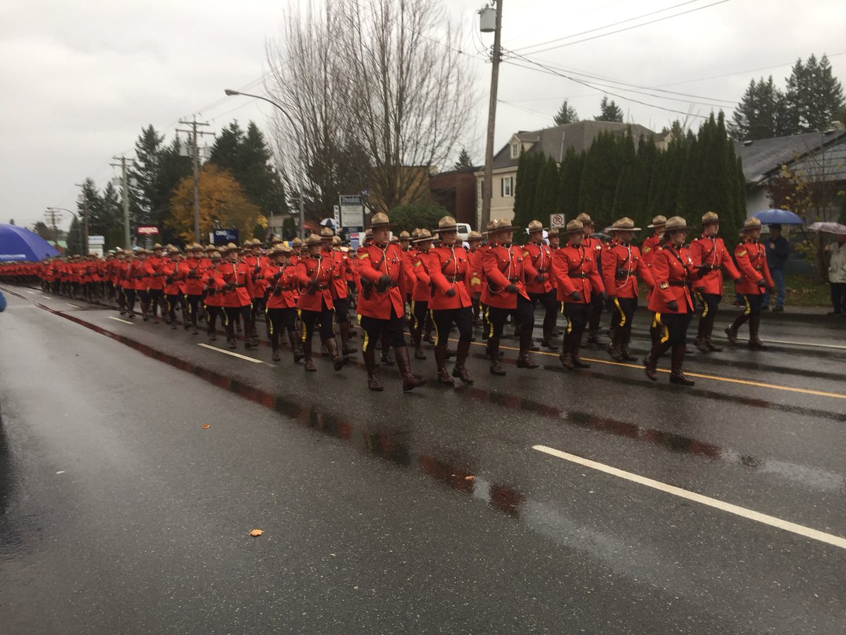 KBBenning's tweet photo. A sea of red as @rcmpgrcpolice make their way to the Abbotsford Centre #Abbotsford https://t.co/uoVXmDhp1y