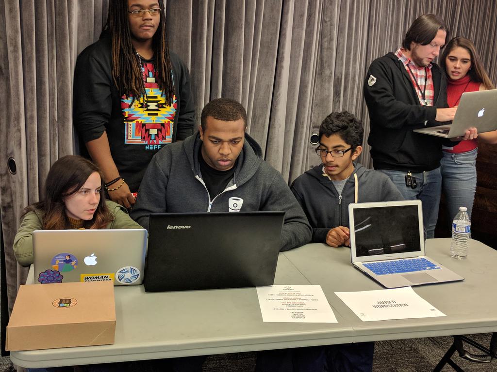 goodienation's tweet photo. @interceptatl, @flylifeorg, @_TribeTalk, + @amiglo getting ready to show the judges their products! #HacktheViolence #GoodieHack https://t.co/XB1IwoyhOi