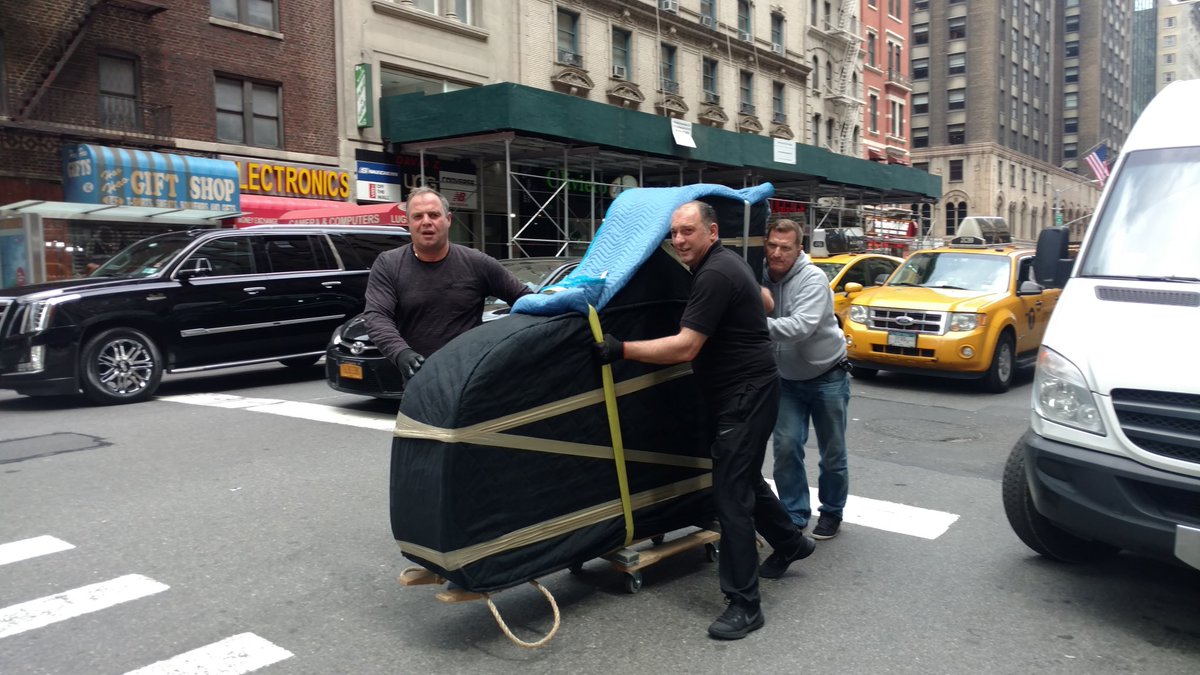 TheEventOffice's tweet photo. Moving a grand piano through Manhattan for a special event. Victory lap! #eventoffice #piano #nyc #pianomoving #behindthescenes #partyplanner #steinway https://t.co/eR5MeOHy8o