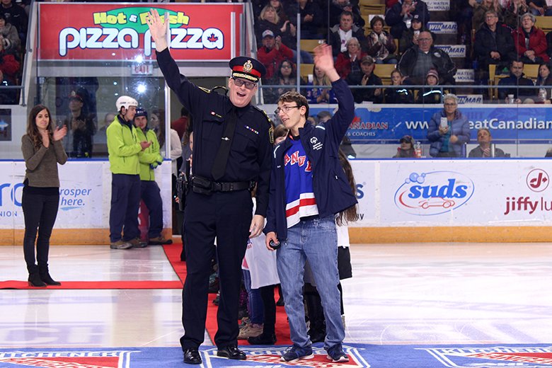 OHLRangers's tweet photo. A BIG thank you to @SOOntario Special Olympic athlete Eric Pomery and @WRPSToday @Chief_BLarkin for dropping the puck before tonight's game! #PBOvsKIT #BeAFanSOO https://t.co/CdzChR7flg