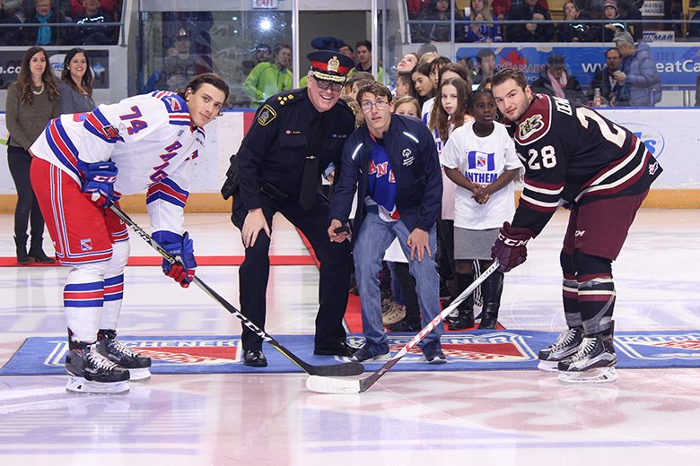 OHLRangers's tweet photo. A BIG thank you to @SOOntario Special Olympic athlete Eric Pomery and @WRPSToday @Chief_BLarkin for dropping the puck before tonight's game! #PBOvsKIT #BeAFanSOO https://t.co/CdzChR7flg