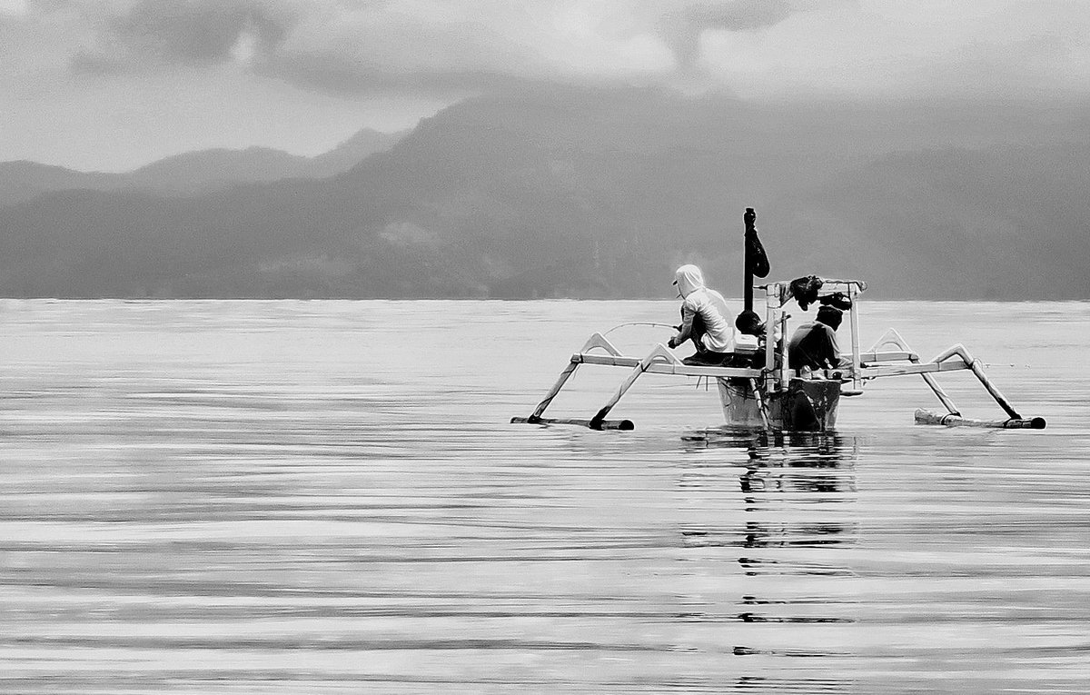 High key B&amp;W of recreational fishers in the Lombok Strait micro-jigging. Pic taken before a storm #highkeyphotography #indonesianthroughflow #Lombok Pic by Jes