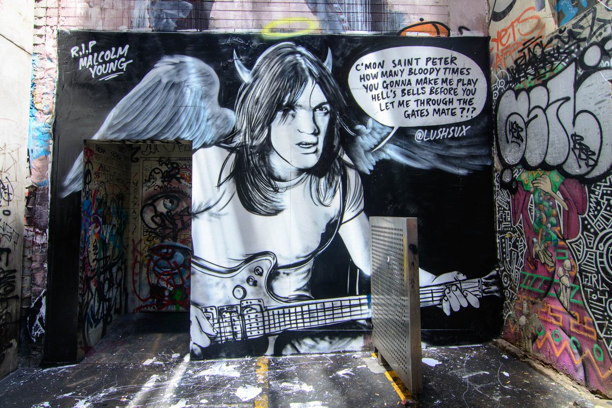 cityofmelbourne's tweet photo. A very Melbourne tribute to Malcolm Young in  AC⚡️DC lane. 
(art by @lushsux) https://t.co/4ofL9yNSQG
