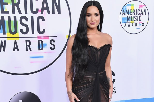billboard's tweet photo. Demi Lovato shrugs off ALLLL the haters with her "Sorry Not Sorry" performance #AMAs https://t.co/R6AtsqMQNl https://t.co/2SyJfLqIbA