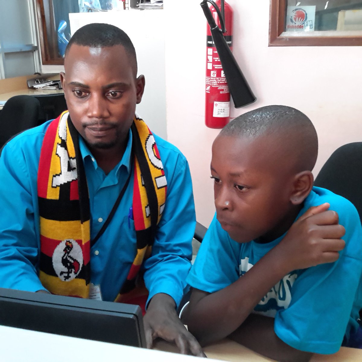 CNtabadde's tweet photo. Akira Mutonyi preparing to read news with Moses Walugembe of @bukeddefama #KidsTakeOver @UNICEFUganda https://t.co/x9imksQvtW