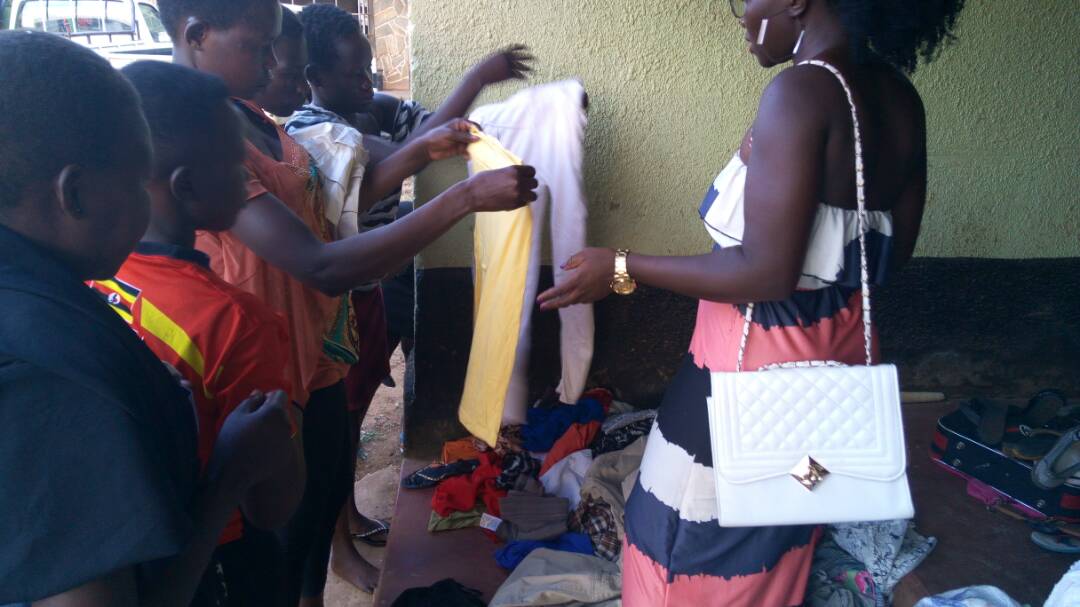 RctGulu's tweet photo. @rotaract256 @FriendshiPhotos @hashtag_gulu and that's how #DressAChild went on clothes distribution #RotaractAt50 https://t.co/NPByEtt3YU