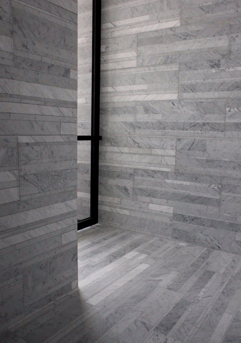 archiproducts's tweet photo. A penthouse in @FosterPartners's #IndexTower in #Dubai is stripped back to its shell and redesigned by #Anarchitect. The juxtaposition of Lithoverde® recycled stone by @salvatoristone with wood and iron makes the staircase a stunning visual focal point: https://t.co/TT56CSUL12 https://t.co/cQZi68GMv3