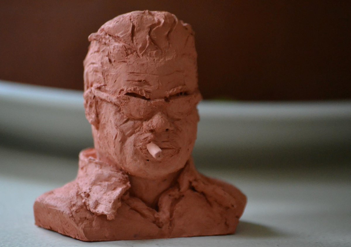 juniper__love's tweet photo. Two years ago I made a tiny clay bust of blues musician Lightnin' Hopkins, and it was my one and only foray into sculpture. #livinginrome #statueoverload (I painted it crazy colors to differentiate it from the ones in the Vatican museums.) https://t.co/39Ca0Aa72o