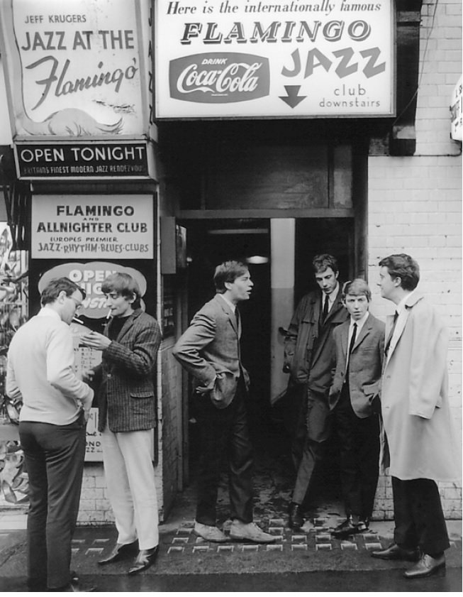 Caroline79's tweet photo. Mods outside The Flamingo Club, Soho in the late 1950s - the mods were inspired by Ivy-league, jazz and Italian style #StyleTribes https://t.co/NYdFr15esK https://t.co/hNzP6v1MlR