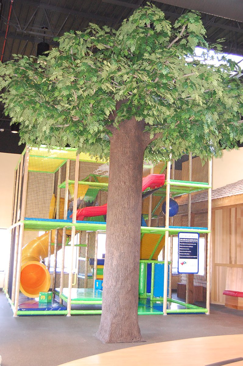 worldsofwow's tweet photo. We designed the play unit at Trinity Lutheran Church in Lisle, IL to blend with the big tree (built around a structural support column) as the center piece of the room! #worldsofwow #indoorplay https://t.co/qWtioN84r0