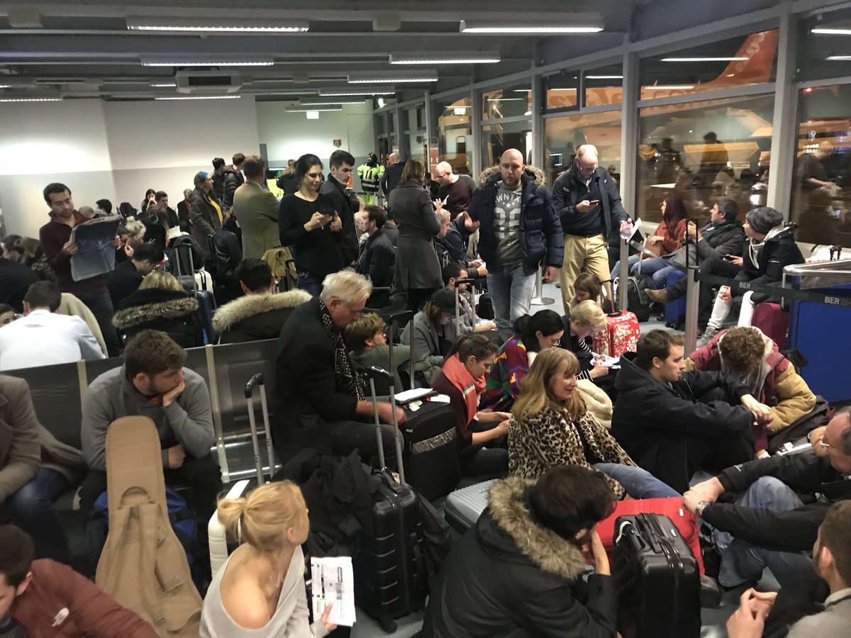 LibertyMarchant's tweet photo. @easyJet SXF to LGW. We’ve been hoarded into the gate only to be told “more wait”. No seats for 75% of the people - What’s going on? 😡 https://t.co/c4DaSrQQ92