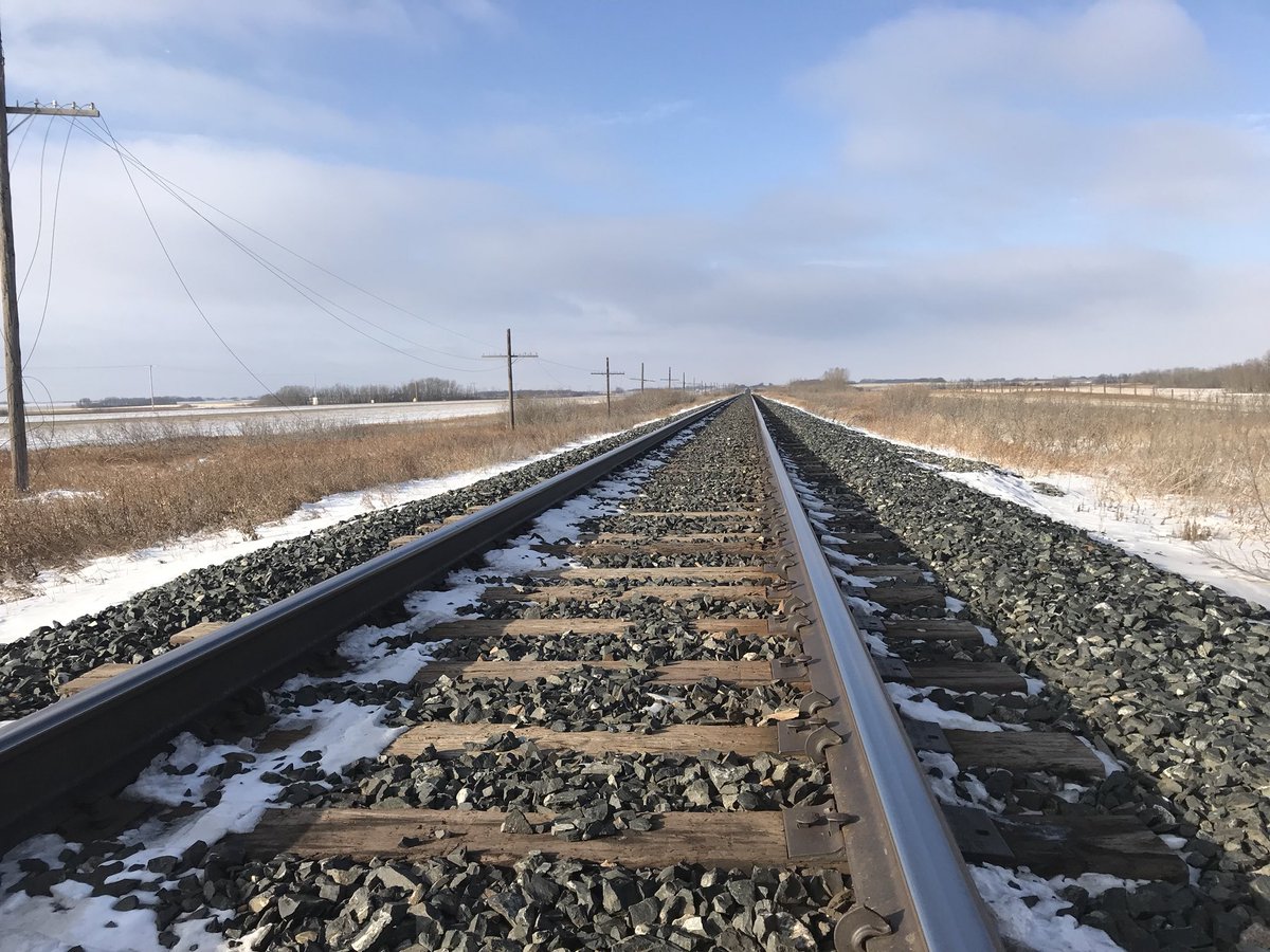 farmsofcanada's tweet photo. These two pieces of steel are arguably the most important piece of infrastructure in Canada. Without the rail lines Canadian farmers wouldn’t be able to move their product to the coast and onto overseas markets. https://t.co/3ddN4IRUrN