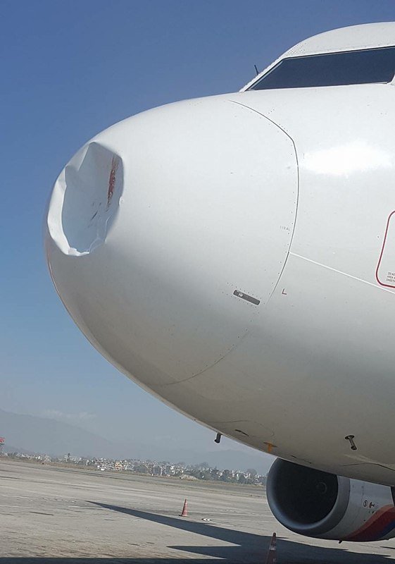 PHOTO: Nepal Airlines A320 9N-AKX suffered a birdstrike, apparently by an eagle, on approach to Kathmandu at 0630UTC on Saturday 18th while flying #RA206 from Delhi with 135 passengers. | Image & info via @sushbhattarai