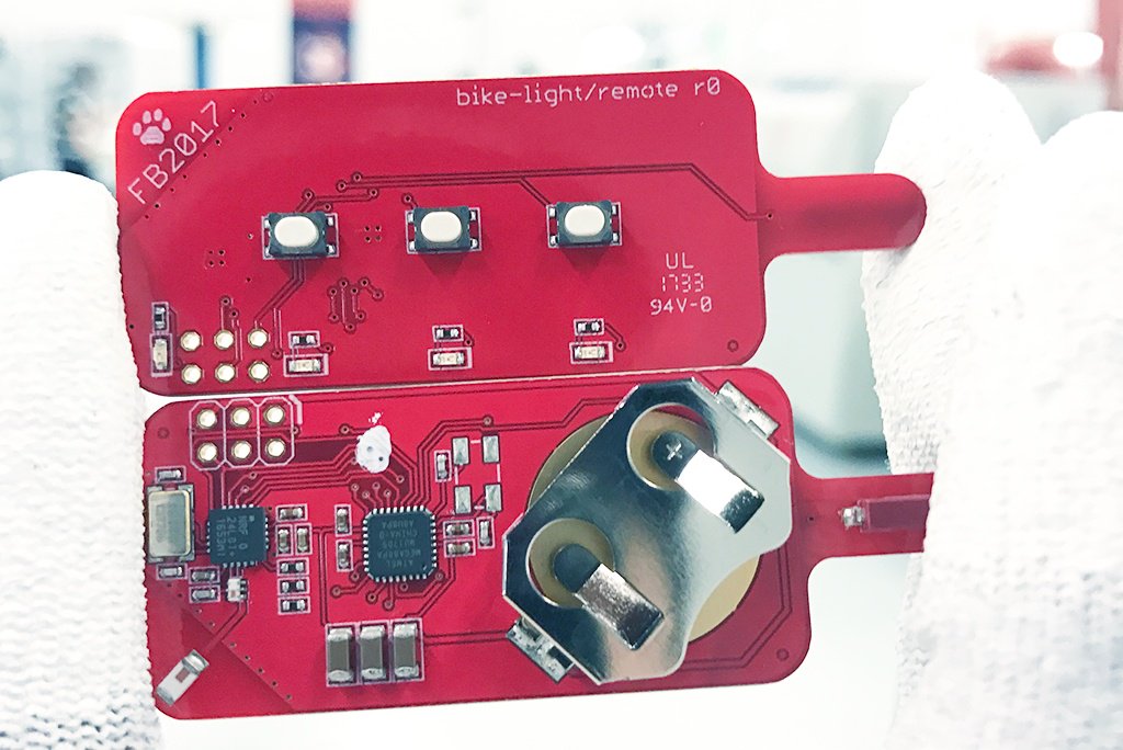 MacroFab's tweet photo. This week's #RedHotPCB is live! And it's a cool concept from one of our customers - a remote for Bike Light Control - including a brake light. https://t.co/viDKIBgcdJ | #PCBA | #ManufacturingMonday https://t.co/P2hAWsIBwC