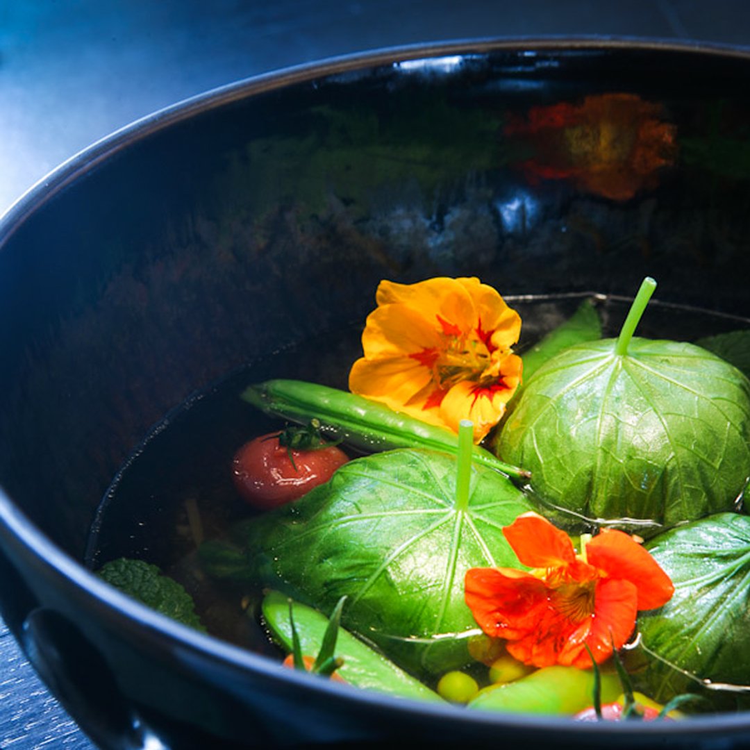 Vegetarian? We got you covered!
.
Sample Dandelion's vegetarian must-try —  a sweet corn broth, nasturtium leaf dumplings with baby summer vegetables and nasturtium flowers.