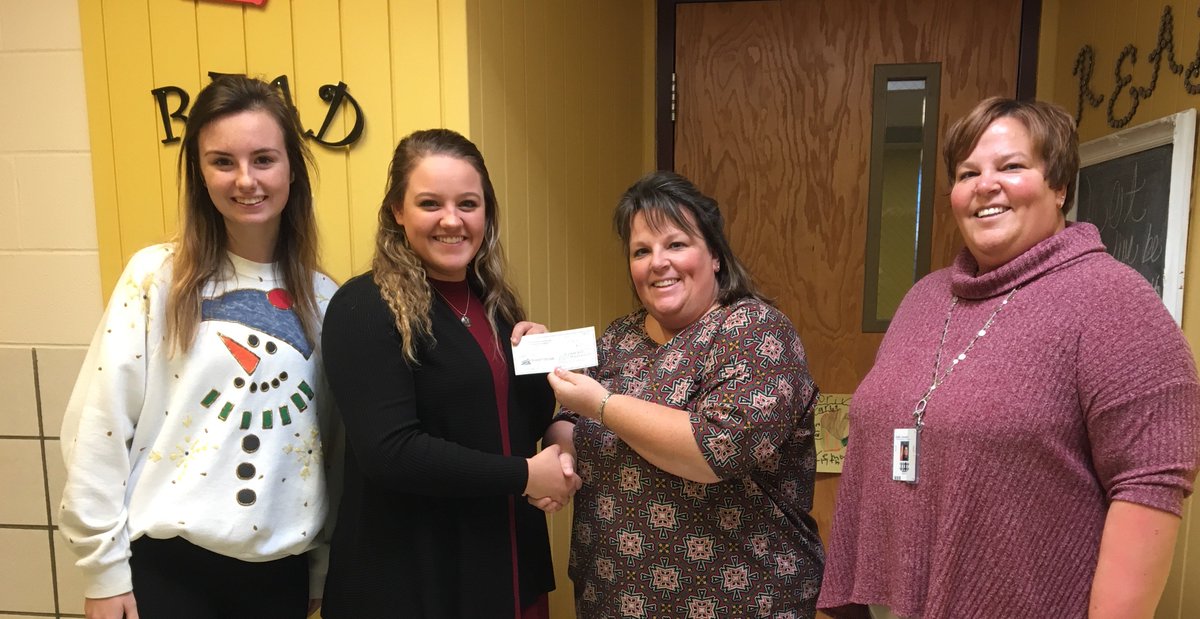 GKBDistrict's tweet photo. Becky Thomas and Holly Joseph, representatives from Garrett Alpha Chi chapter of Tri Kappa, present a check to Allison Wichman and Chloe Hinkle to help with costs for their "Garrett Claus" project as part of their ILE project at Garrett High School. https://t.co/DIHSqpy3z6