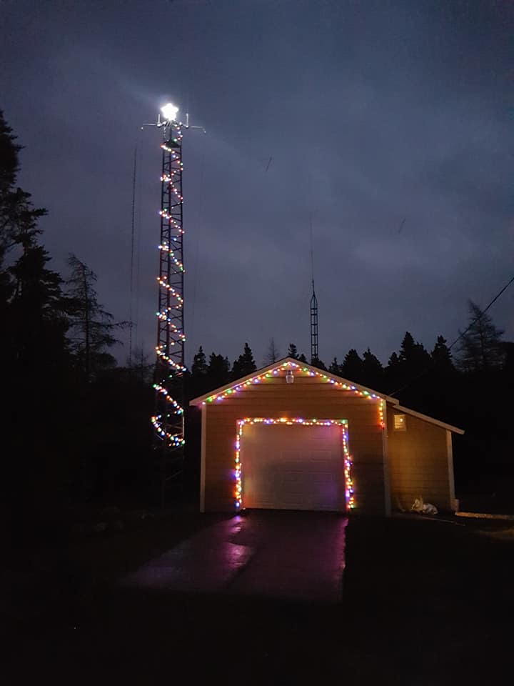 SONRA_NFLD's tweet photo. VO1IDX spreading some Christmas cheer on his backyard tower.. Yes there's some HF there as well, and the new 2m repeater antenna! #hamradio #hamr https://t.co/UNT42lqN4q