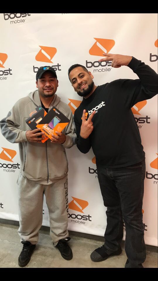 RyanMaierMN's tweet photo. @AhmadAmsar4 and @VisionBoost1 having a blast switching people from Metro today at the @BrklynCenterMN @boostmobile! #noturkeys #turkeyswontsaveyou #switchhappens https://t.co/FphYpuf1CI