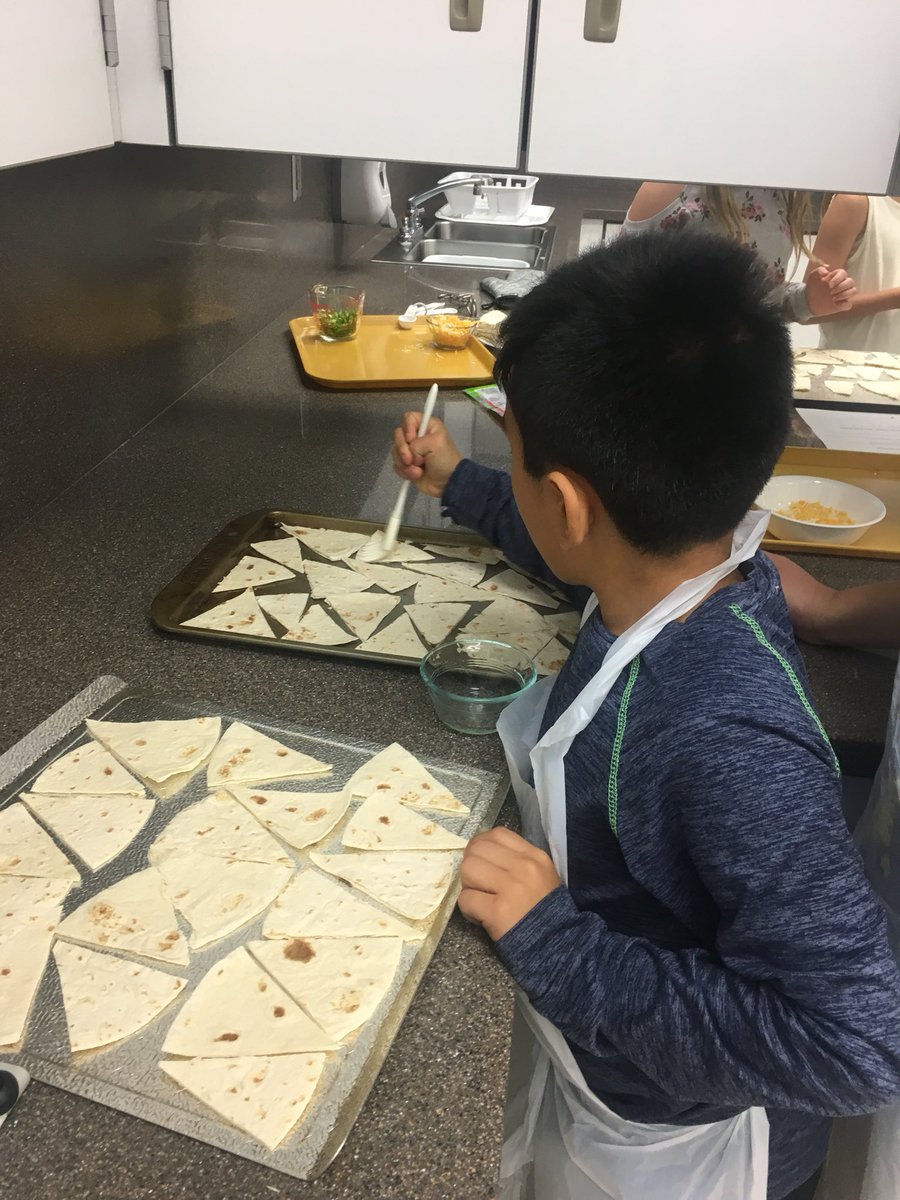 AmandaLFay's tweet photo. Homemade nachos with @ISD719Wave kiddos were a great success! Everyone enjoyed them. @ISD719CommEd @isd719 #communityeducation #kidscook #kidchefs #cookingfun https://t.co/Y8gV6MWCUE