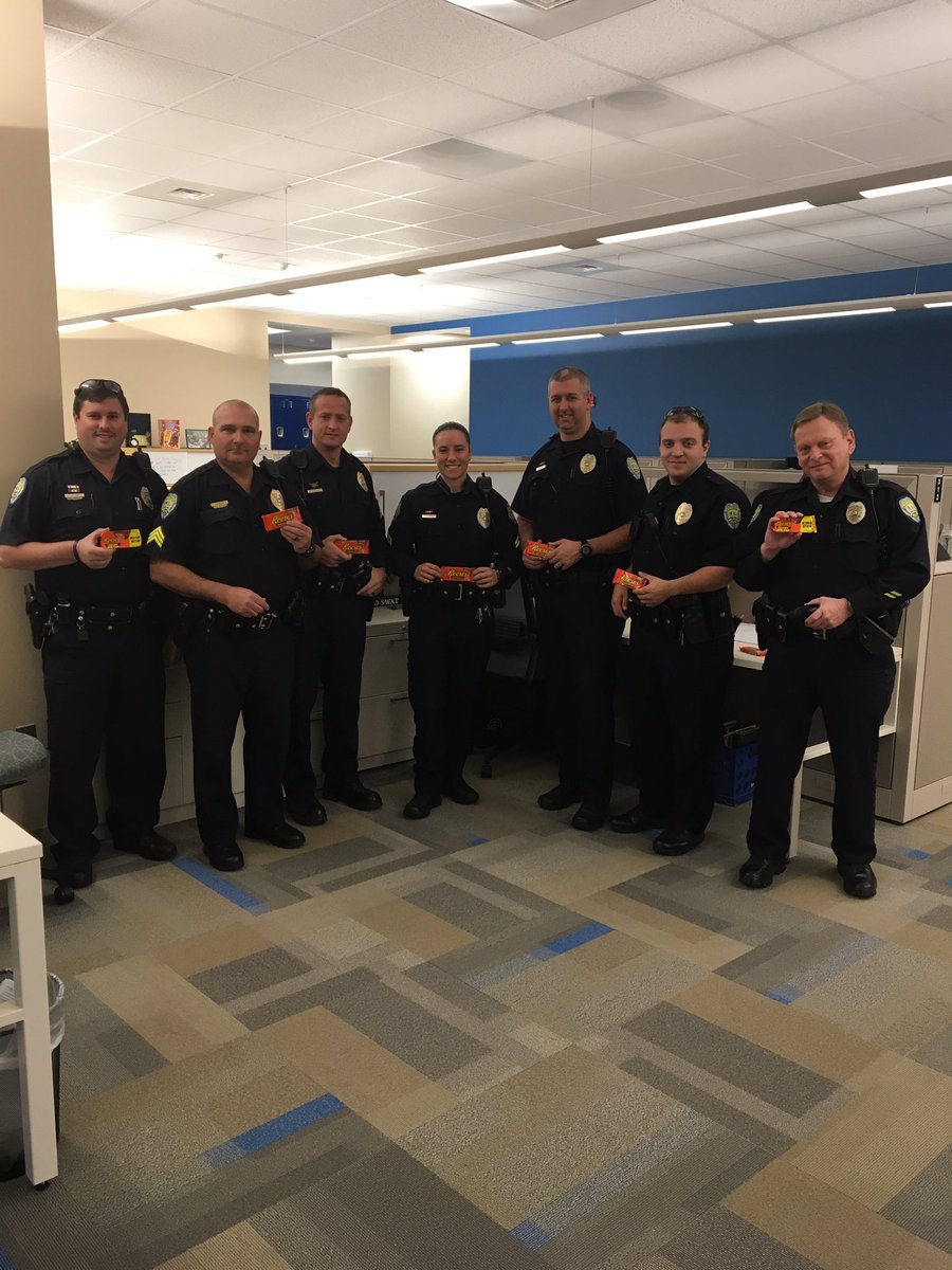 cityofwspolice's tweet photo. Winston Salem Police Officers receiving Reese's Candy courtesy of WFMY News 2 #2BeSweet give away #WSPolice 77 https://t.co/dhr1Bu0CsZ