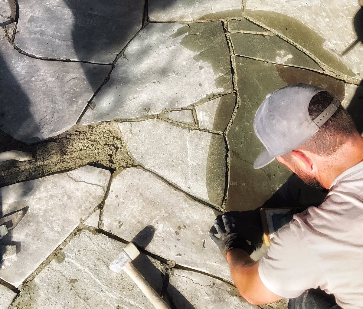 HardscapeCanada's tweet photo. Our work, our canvas. It's heavy, dusty and dirty. Upon it we have built a life for ourselves, strong backs, and many pieces for our customers to enjoy. 
#ROCKSandSTONES #oldschool #craftsmanship #Victoria #VancouverIsland #BC #yyj 
Where #Stone creates #Art. #construction https://t.co/qKSzoYDwmn