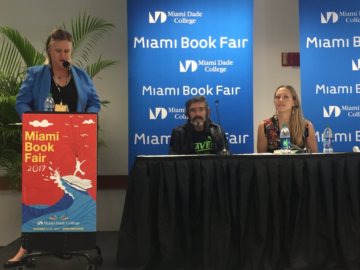 llhuttenbach's tweet photo. Me, looking somewhat pensive as the moderator introduces us at the #MiamiBookFair , probably thinking: "I wish I'd eaten more free breakfast in the #author lounge." #RunningWithRaven https://t.co/OTHoQfLByh