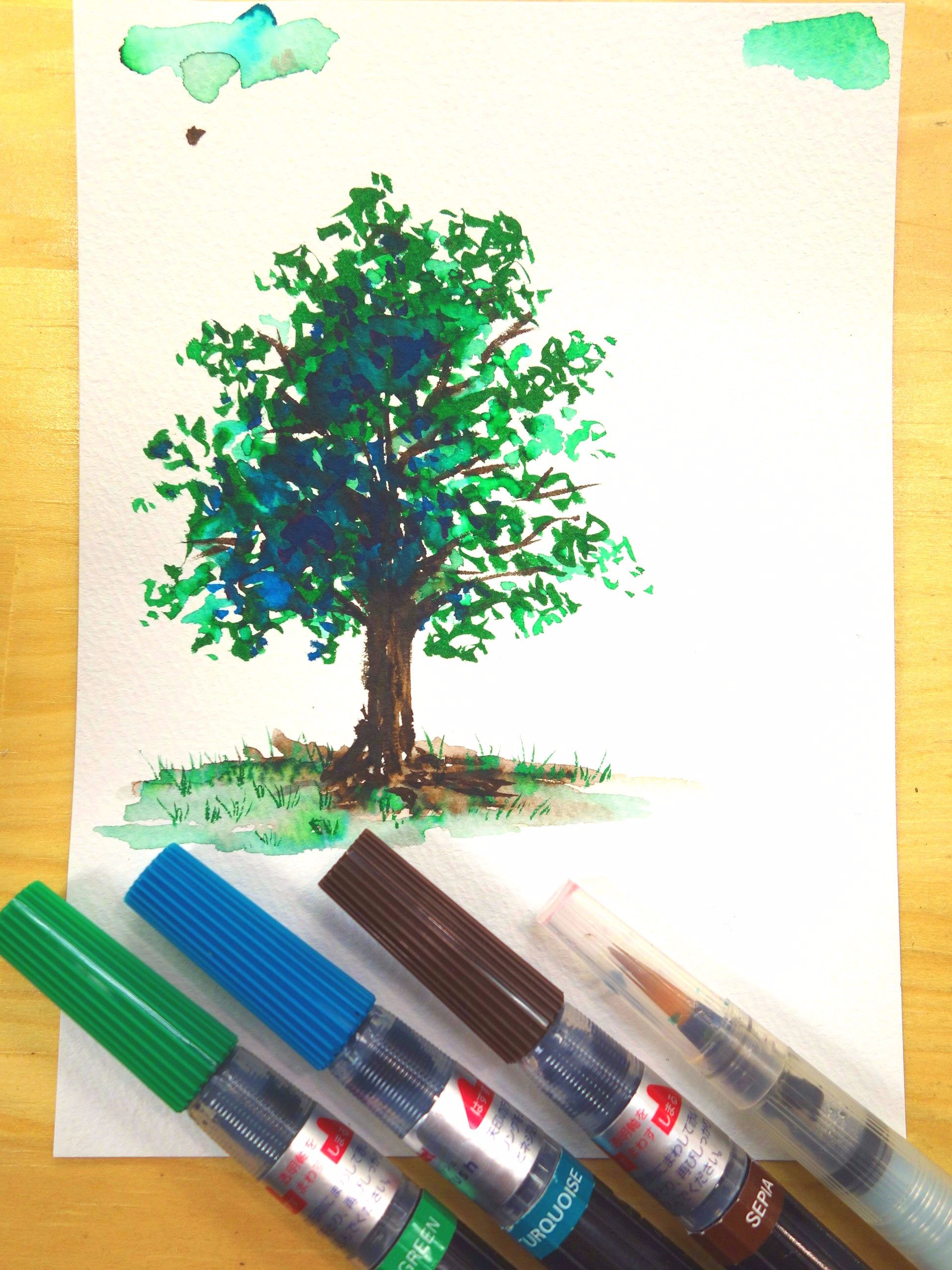 ユーアーツ ぺんてる アートブラッシュ でお手軽水彩イラスト 筆ペンタイプでパレット不要 水筆でぼかしも簡単 グリーン ターコイズ セピアの３色で木を描いてみました 全18色 １本 540円 手軽でとっても楽しいのでぜひ試してみてね お求め
