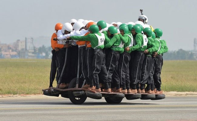 ndtv's tweet photo. Indian Army creates world record with 58 men on single motorcycle https://t.co/18jpTzXJYB https://t.co/DGIpjkt1jp