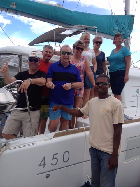Happy #TravelTuesday! Here is a photo of Mark R. and crew aboard Toes in the Water. They returned from a charter in the BVIs a few days ago and had a great time! #YourDYC #BritishVirginIslands #BVIStrong