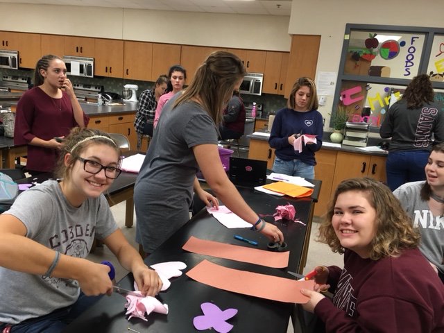 cobden_high's tweet photo. October is infant loss awareness month. FCCLA members cut out over 250 scent cloths to donate to the NICU at Children's Hospital in honor of Josephine and Iris Sheridan last month. https://t.co/1t9kCZpRU6