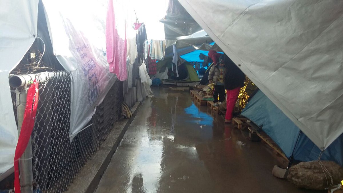 MSF_Sea's tweet photo. #Vanthy "Reception Centre" is waterfront property after storms hit #Samos yesterday. Somewhere between 1,704 and 2,137 cold, wet, vulnerable #people are living here in facilities meant for just 920. Seriously, this is too much #OpenTheIslands. https://t.co/GDIbTeSckp