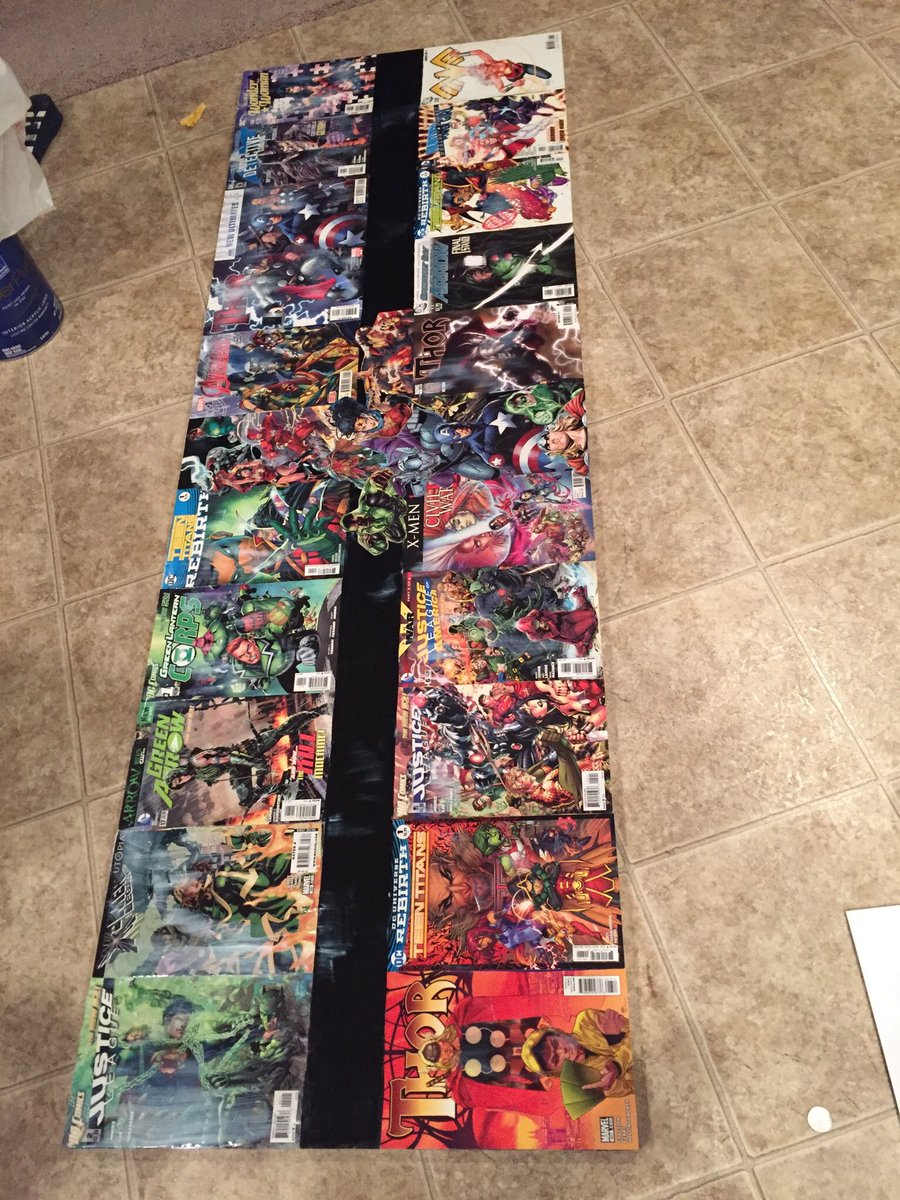 thepuffness's tweet photo. Look guys! Been working on the top to my new desk! Comic book covers and a custom collage for the center piece! #getpuffed! https://t.co/rMx8HpssHZ