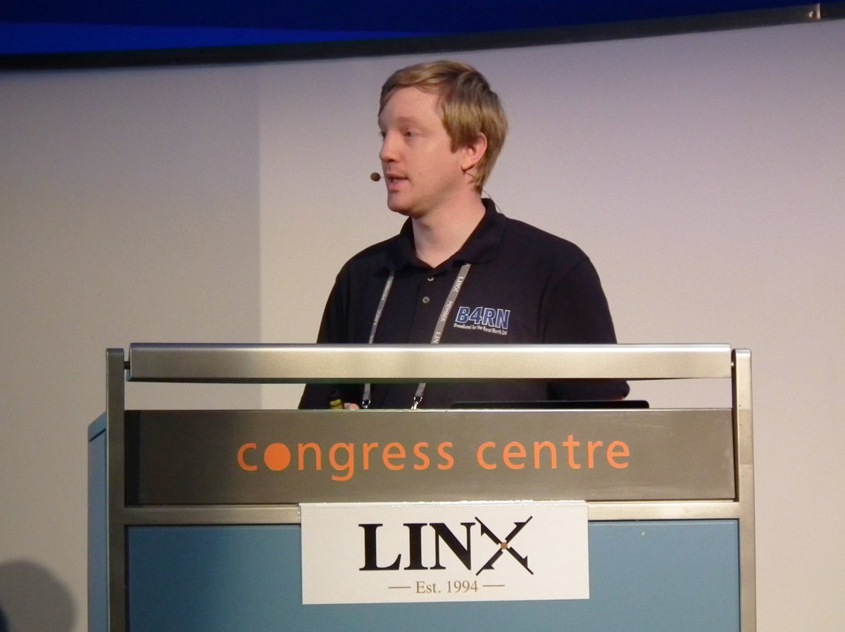 LINX_Network's tweet photo. We're into the afternoon session now on day 2 of #LINX99. Tom Rigg of Broadband for the Rural North (B4RN) who is presented a network update and details on community driven full fibre rollout https://t.co/1NlYhETZ2O