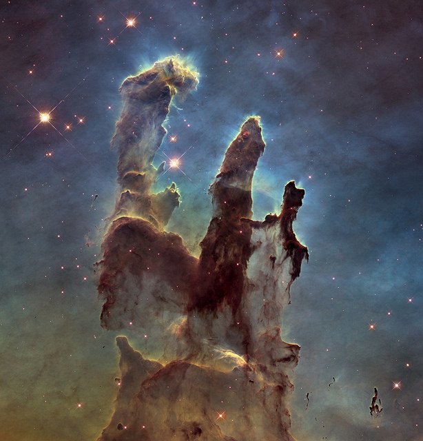 NASAHubble's tweet photo. #HubbleClassic New stars are being born in the finger-like tips of the Eagle Nebula’s Pillars of Creation, which stretch across 5 light-years of space: https://t.co/zF2uZtn1hQ https://t.co/YTiPJmYf4A