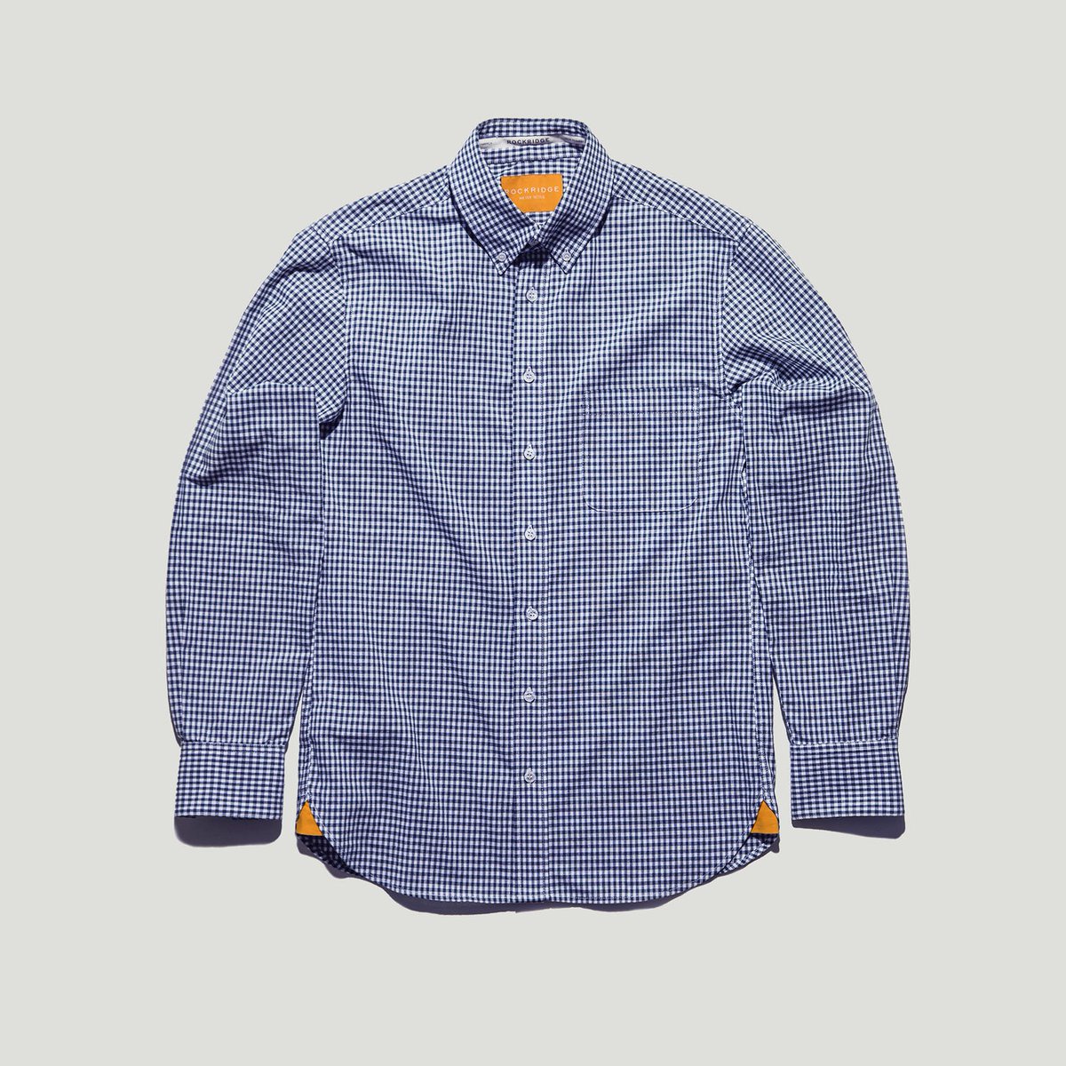 Blue Gingham for the holiday's with hits of our signature orange detailing. Available 12.5.17