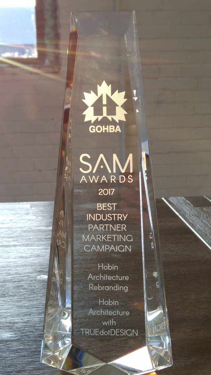 TruedotDesign's tweet photo. Another SAMMY for @TRUEdotDESIGN + @HobinArchitects! @GOHBA_Ottawa's Best Industry Partner Marketing Campaign goes to Tdot for our collab with Hobin Architecture earlier in 2017. #SAM2017 #SAMawards #OttawaMarketingAgency #GOHBAawards https://t.co/KTcSm047ak