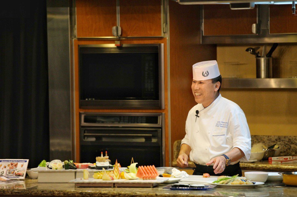 HALpartnerSHIPS's tweet photo. Guests on the Grand Asia &amp; Pacific Voyage were in for a #TuesdayTreat when our partner Sushi @ChefAndyMatsuda was onboard and shared his tips and tricks in the Culinary Arts Center. Thanks to @Lozula for the photo! https://t.co/M9rtyBwOz3