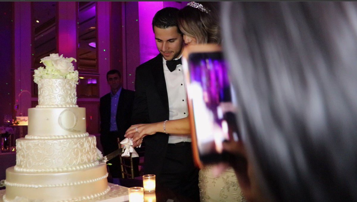 This young lady literally bumped my camera lens with HER iPhone since I was in "HER" way of trying to capture the Bride &amp; Groom cutting their cake. Was she drunk? Stupid? Both? #blockedbride #rudeguests #weddingphotos #weddings
