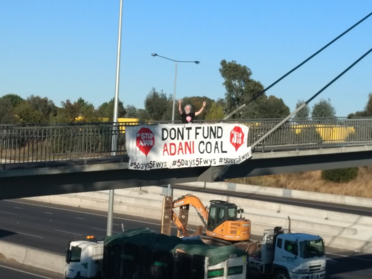 Alan_Cuthbert's tweet photo. Is taht a digger heading of to the Adani Coal Mine? It's day 3 of our 5 day campaign. We will put our #StopAdani  banner on 5 freeways in 5 days. Solidarity with #FLAC in QLD  #5Days5Fwys https://t.co/3kMHwkI2e7