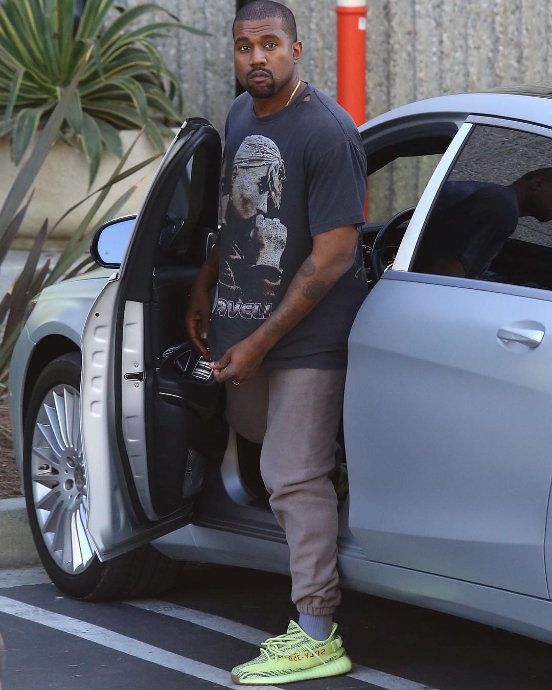 kanye wearing semi frozen yellow