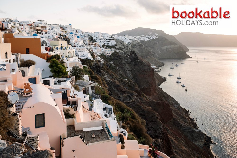 bookableholiday's tweet photo. A beach break in #Santorini with these views would be perfect right now! https://t.co/I4cjiO8djL