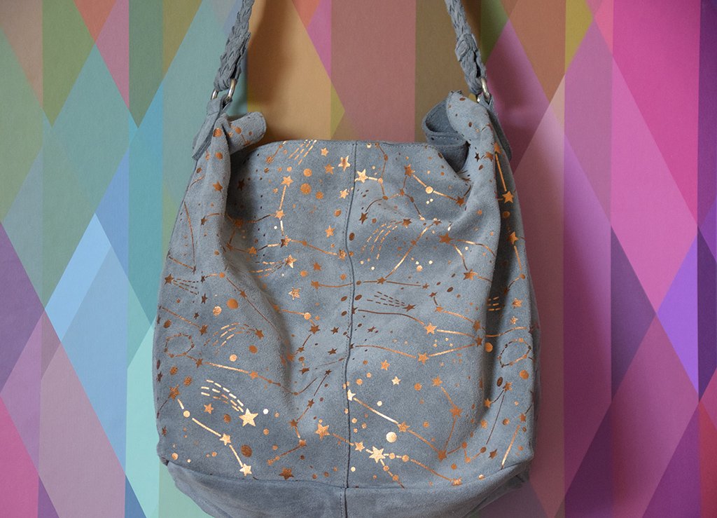 We're seeing stars with this beautifully soft suede Constellation bag. Available online and at the Pop-UP Boutique now.